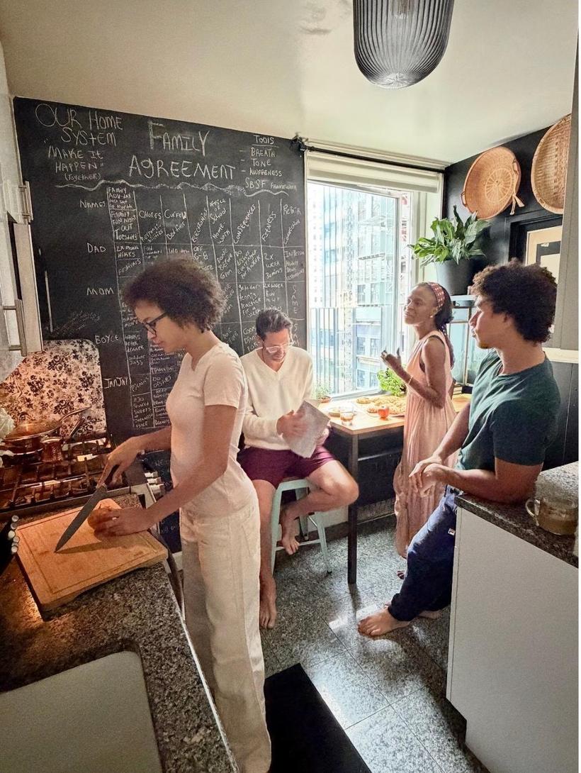 The Family Agreement board on a kitchen wall
